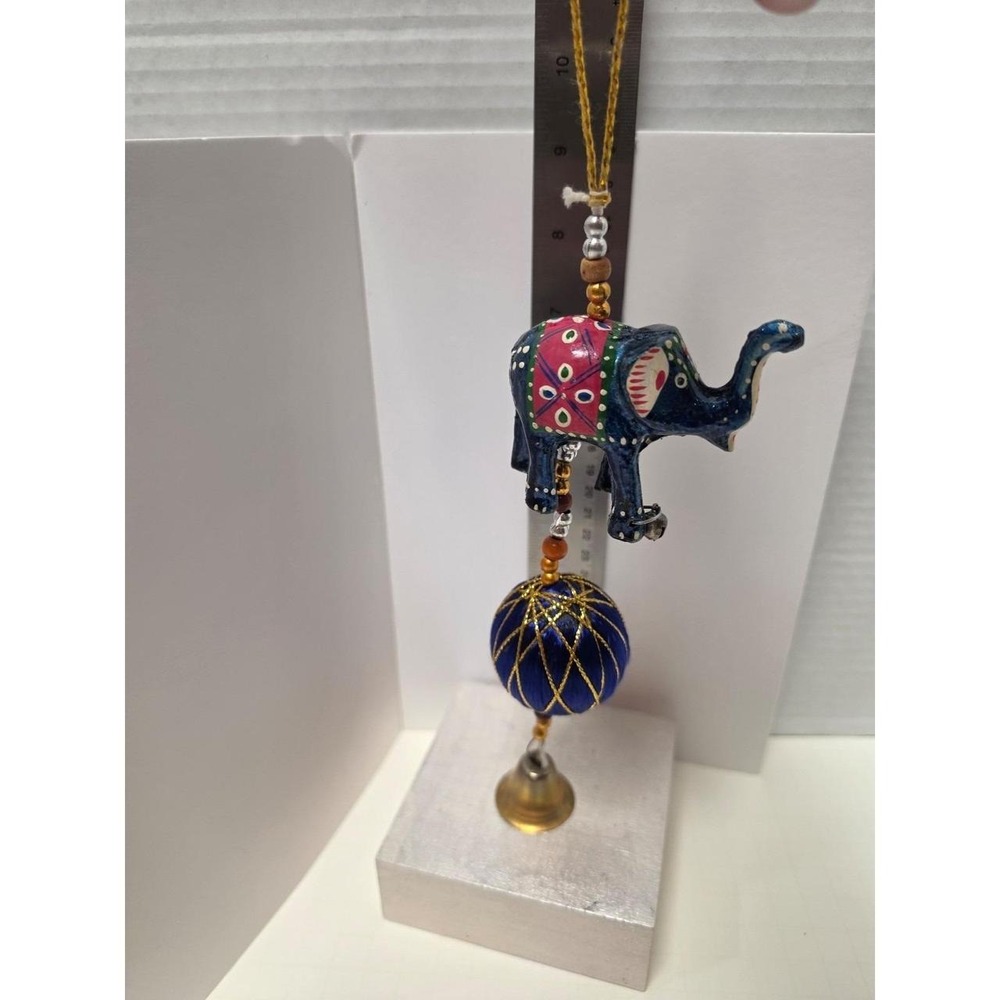 handcrafted Indian-style decorative elephant hanging, likely made from wood